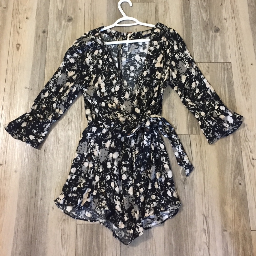 FREE PEOPLE romper with cross body tie size small